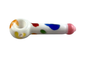 This is the Rainbow Cow Spoon Pipe by Biting Glass available at Ritual Colorado. A vibrant multi-color cow print hand pipe featuring a pink "udder" mouthpiece to round out the whimsy.