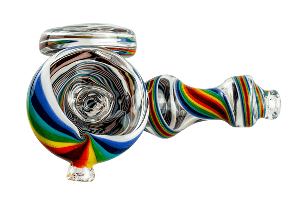 This is the rainbow shirley hand pipe from Technicolor Tonys available at Ritual Colorado. The intricate black and white swirls inside the glass are accented by colorful rainbow swirls on the outside. A beautiful heady hand pipe fit for any glass collection.
