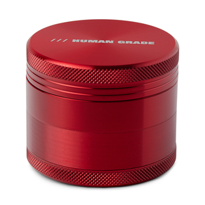 This is a 4-Piece, 2" Aluminum Grinder by Human Grade available at Ritual Colorado. Featuring a sleek finish and included scraper tool this is a great starter grinder and awesome value!