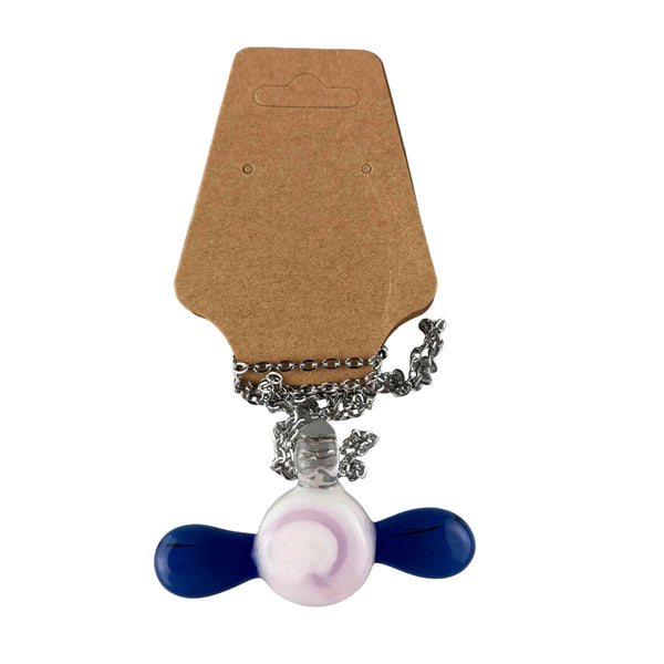 This is the Glass Candy Necklace by Biting Glass available at Ritual Colorado. Featuring a pink & white swirling candy with twisting blue wrappers on each side. This fun necklace comes on an 18" stainless steel chain.