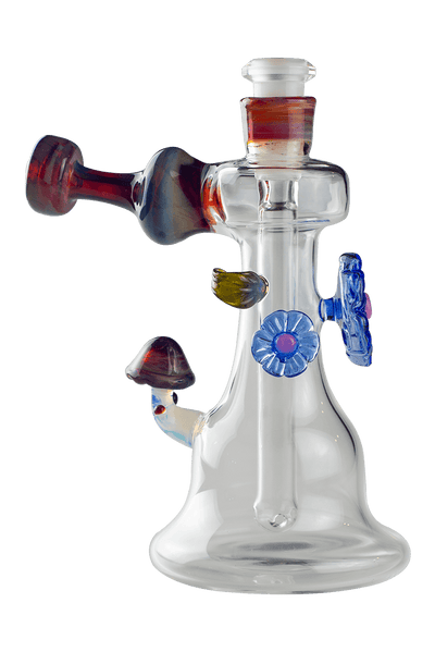 This is the Shroom Flower Bubbler from Technicolor Tonys available at Ritual Colorado. This beautiful heady glass piece features a stable base and clear glass which is accented by colorful flowers and a mushroom.