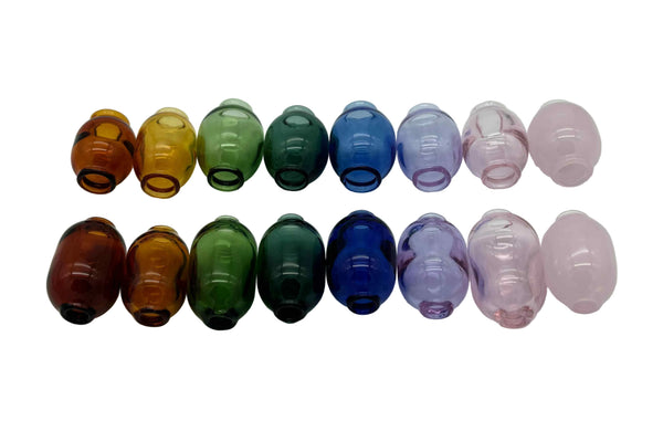 These are Handmade Glass Macrame Beads by Biting Glass available at Ritual Colorado. Available in a range of fun colors these hand crafted beads are the perfect compliment for your crafting project.