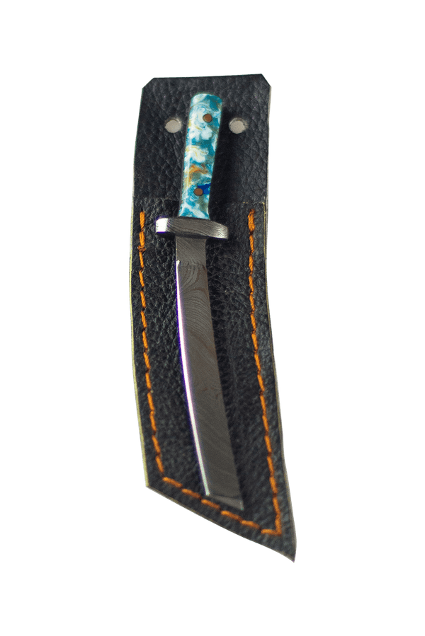 This is the 2-Pin Katana Dab Tool from Dabmascus available at Ritual Colorado. These beautiful handmade tools feature beatiful damascus steel blades and colorful handles for a refined dabbing experience.