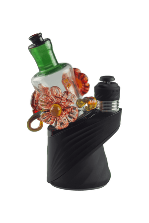 This is the Flower Garden Puffco Peak Dry Top by Technicolor Tony available at Ritual Colorado. A stylish upgrade featuring hand blown glass flowers and leaves and a colorful mouthpiece.