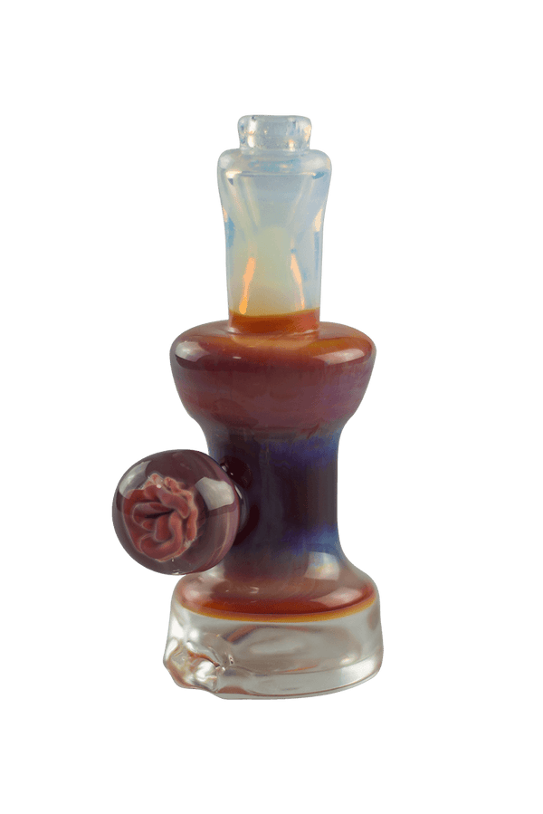 This is the Collab Vibrant Rose Puffco Peak Dry Top by Technicolor Tony and Biting Glass available at Ritual Colorado. A fun upgrade from your erig made right here in Denver, Colorado