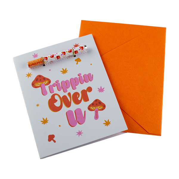 The "Trippin Over U" Greeting Card by KushKards with matching metal One Hitter available at Ritual Colorado. Spread the love for fungi and cannabis with this fun greeting card.