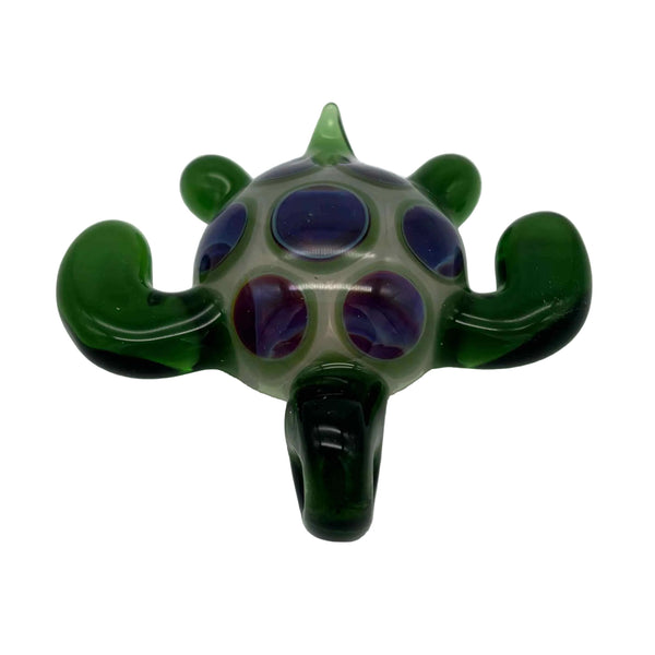 This is the Swimming Sea Turtle Pendant by Biting Glass available at Ritual Colorado. Handmade from borosilicate glass, this piece of wearable art features vibrant colors and subtle details.