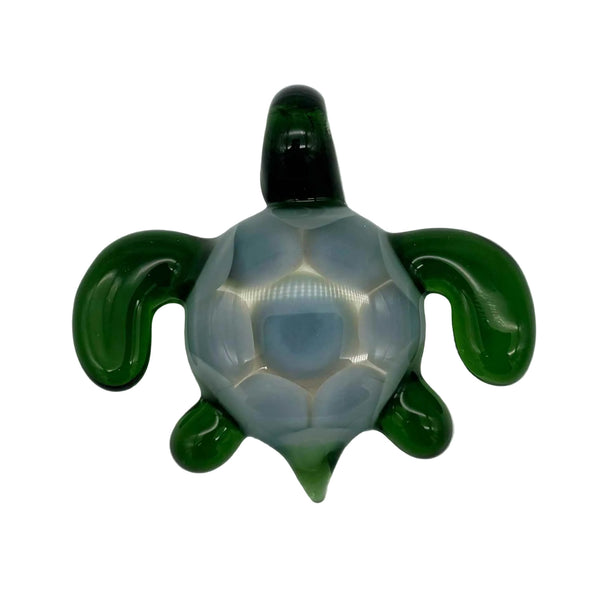 This is the Swimming Sea Turtle Pendant by Biting Glass available at Ritual Colorado. Handmade from borosilicate glass, this piece of wearable art features vibrant colors and subtle details.