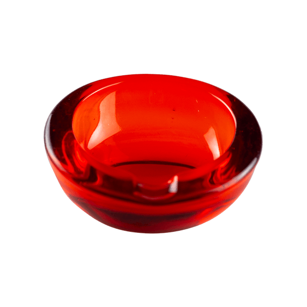 This is the Viking Small Orb Ashtray in Persimmon from Heady Vintage available at Ritual Colorado. The beautiful vintage glass ashtray adds Mid-Century Modern style to any room with its beautiful color and convenient notch for storing your devices and accessories.