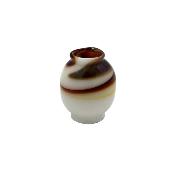 This is the White / Amber Purple Color Swirl Glass Macrame Bead by Biting Glass available at Ritual Colorado. Handmade in Denver, CO and featuring vibrant combinations of glass colors these beads are the perfect accent to your project.