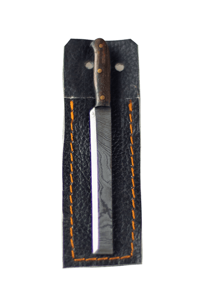 This is the sushi knife dab tool from Dabmascus available at Ritual Colorado. It features a three-pin handle and sushi-knife style blade from high-quality Damascus Steel. 