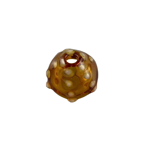 This is a Handmade Glass Bead by Biting Glass available at Ritual Colorado. Featuring hand drawn patterns these tube-shaped beads are perfect to string onto a necklace, bracelet or to use as a dred bead.