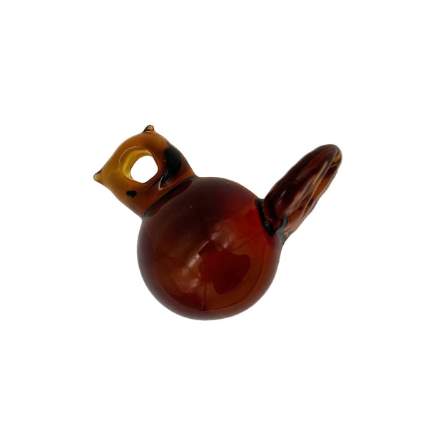 This is the Yellow Chubby Glass Bird Ornament by Biting Glass available at Ritual Colorado. These fun handmade glass ornaments feature vibrant colors and fun sitting bird motifs.