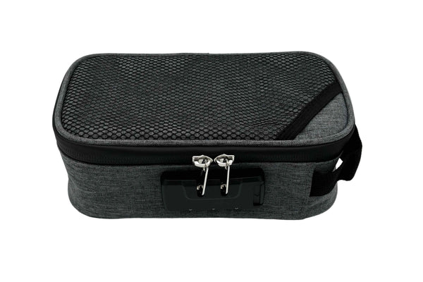 This is the Grey Locking Zipper Stash Bag by Ritual Co. available at Ritual Colorado. A sleek portable carry case that is weather resistant, has a programmable combination lock and features many customization options to fit all your gear.