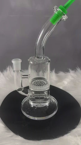 This is the beehive glass bong from Ritual Glass available at Ritual Colorado. Featuring a 14mm female connection, in-line and honeycomb percs and a bent mouthpiece for comfortable sessions.