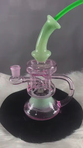 This is The Coliseum water piece from Ritual Glass. Featuring four vertical pillars with a recycler return this beautiful glass is a great addition to any collection.