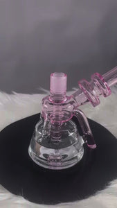 This is the Bubble Blaster Glass Bubbler from Ritual Glass available at Ritual Colorado. Featuring a sturdy footprint and beautiful colored glass accents this is a great everyday bong. Featuring a 14mm female connection for easy compatibility with your favorite dry herb vaporizers and dabbing quartz.