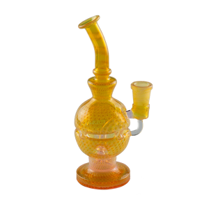 This is the Round The World Glass Rig from Ritual Glass available at Ritual Colorado. It features intricate American colored glass rod in a beautiful fab egg shape. Featuring a 14mm female connection this is a great stylish dab rig.