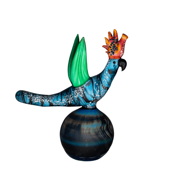 This is the Bird in Paradise rig from Hardman Art Glass available at Ritual Colorado. It features stunning colors with a matte finish in this one-of-a-kind masterpiece. This handblown heady glass is an incredible addition to any collection.