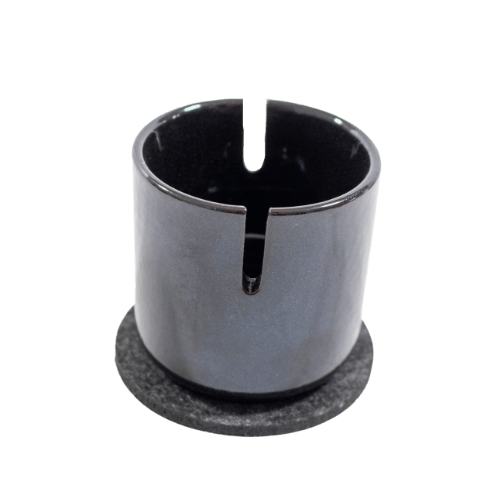 This is the Suet Jade Porcelain Stand from QaromaShop available at Ritual. Featuring notches for your heater coil this is perfect for safely storing your ball vaporizer while hot.