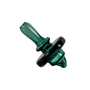 This is the Pacifier Carb Cap from Ritual Glass available at Ritual Colorado. It features a beautiful green finish and two directional air holes for maximum concentrate movement inside your banger. The open air hole at the top allows users to manually control exactly how much air is going in at any time. 