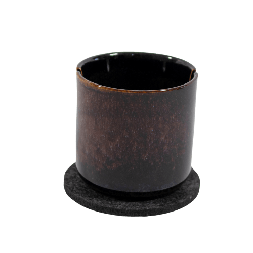 This is the Suet Jade Porcelain Stand from QaromaShop available at Ritual. Featuring notches for your heater coil this is perfect for safely storing your ball vaporizer while hot.