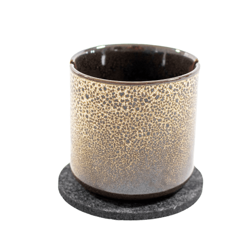 This is the Suet Jade Porcelain Stand from QaromaShop available at Ritual. Featuring notches for your heater coil this is perfect for safely storing your ball vaporizer while hot.