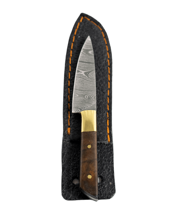 This is the Chef's Knife Dab Tool from Dabmascus available at Ritual. It features a two-pin handle and high-quality Damascus Steel blade for a truly unique and special dab tool.
