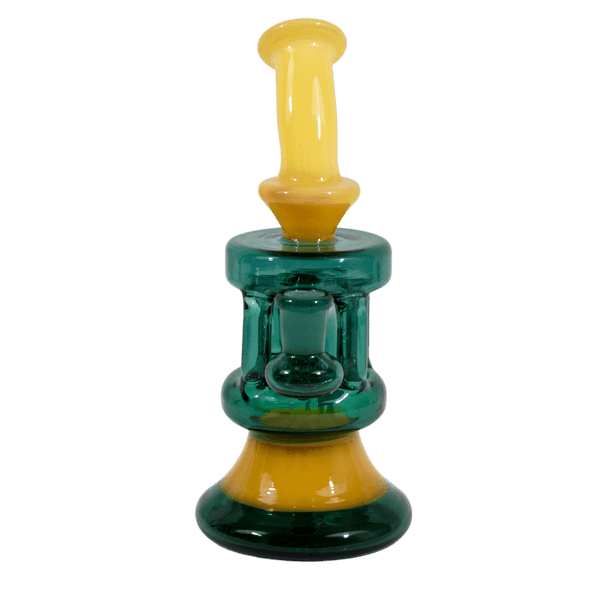 This is The Coliseum water piece from Ritual Glass. Featuring four vertical pillars with a recycler return this beautiful glass is a great addition to any collection.