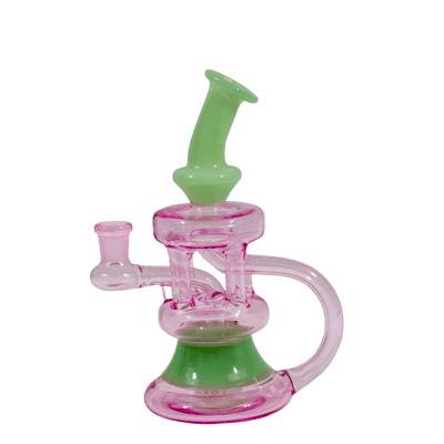 This is The Coliseum water piece from Ritual Glass. Featuring four vertical pillars with a recycler return this beautiful glass is a great addition to any collection.