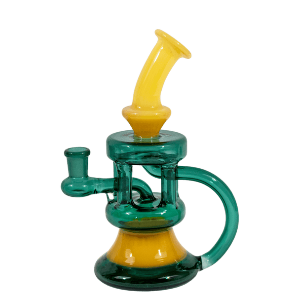 This is The Coliseum water piece from Ritual Glass. Featuring four vertical pillars with a recycler return this beautiful glass is a great addition to any collection.