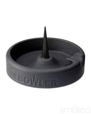 This is the minimalist silicon ashtray from Debowler available at Ritual. It features an aluminum spike for easy bowl clearing and a soft-touch silicon body that is easy to clean.