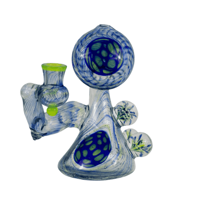 This is Finding Flowers in the Sky - Ferankshanaw (#752) from Steve Kelnhofer available at Ritual Colorado. This beautiful heady rig features impressive blue, green, yellows as well as three signature marbles that add tons of dimension and depth. 