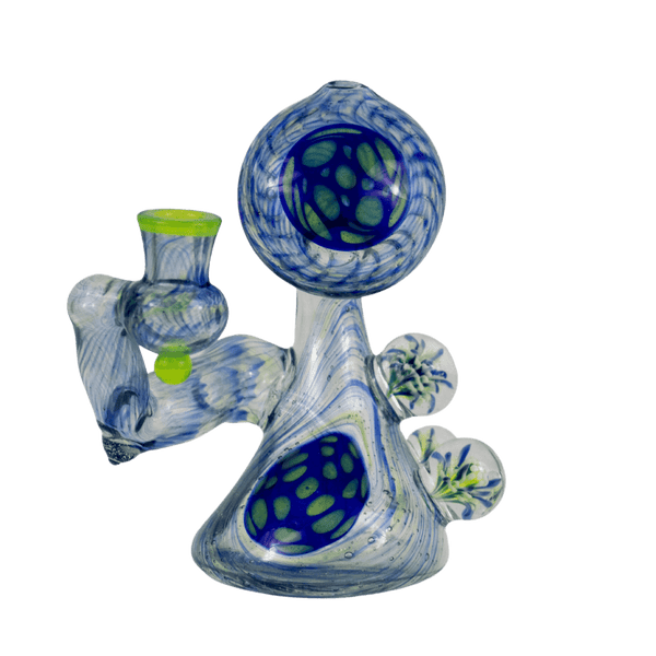 This is Finding Flowers in the Sky - Ferankshanaw (#752) from Steve Kelnhofer available at Ritual Colorado. This beautiful heady rig features impressive blue, green, yellows as well as three signature marbles that add tons of dimension and depth. 