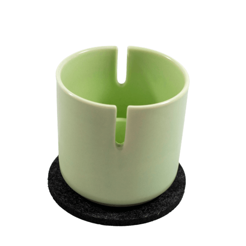 This is the Suet Jade Porcelain Stand from QaromaShop available at Ritual. Featuring notches for your heater coil this is perfect for safely storing your ball vaporizer while hot.