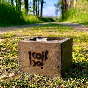 This is the 2021 Fire by Koil Boi available at Ritual. Pictured on a natural path on top of grass with trees in the background.