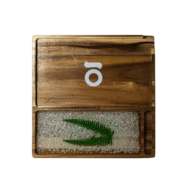 This is the Acacia Wood Tray from Ongrok available at Ritual. Each rolling tray is unique and features handmade details and a foodsafe finish. 
