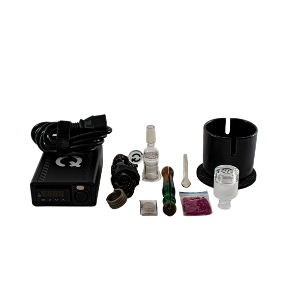 This is the Qaroma DIY Kit from QaromaShop available at Ritual. Featuring a digital PID temperature controller, 20mm heater coil, StabWood coil handle, glass adapter bowl, 3mm aroma ruby pearls, 17mm stainless steel screens, stainless steel scoop tool, Qaroma Housing, and a Suet Jade Porcelain Stand. A flavorful ball vape that delivers impressive clouds.