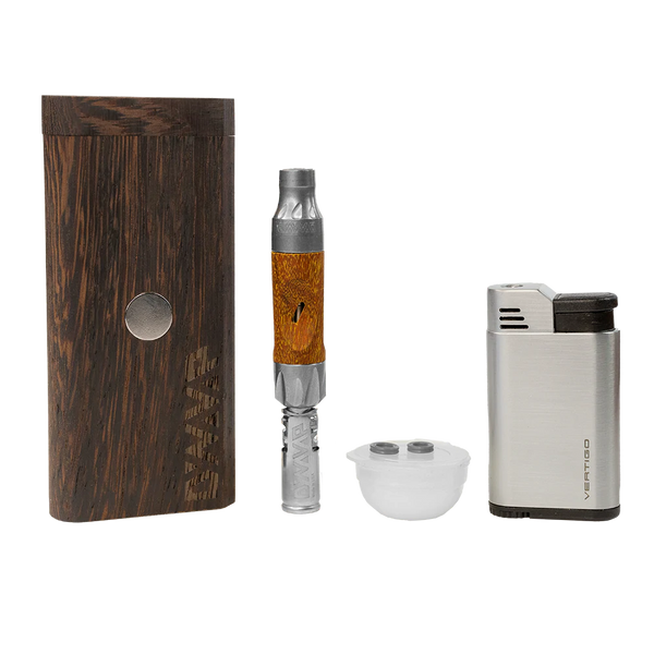This shows all items included in the DynaVap VonG starter pack including the VonG, a DynaStash, a Vertigo lighter, and accessories including wood butter and o-rings. Available at Ritual.