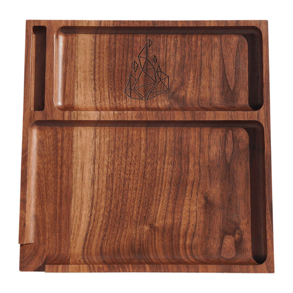 This is the Yaketa wood rolling tray by BRNT Designs. A beautiful wooden rolling tray with separate components for all of your accessories and a corner notch for easy cleaning available at Ritual.
